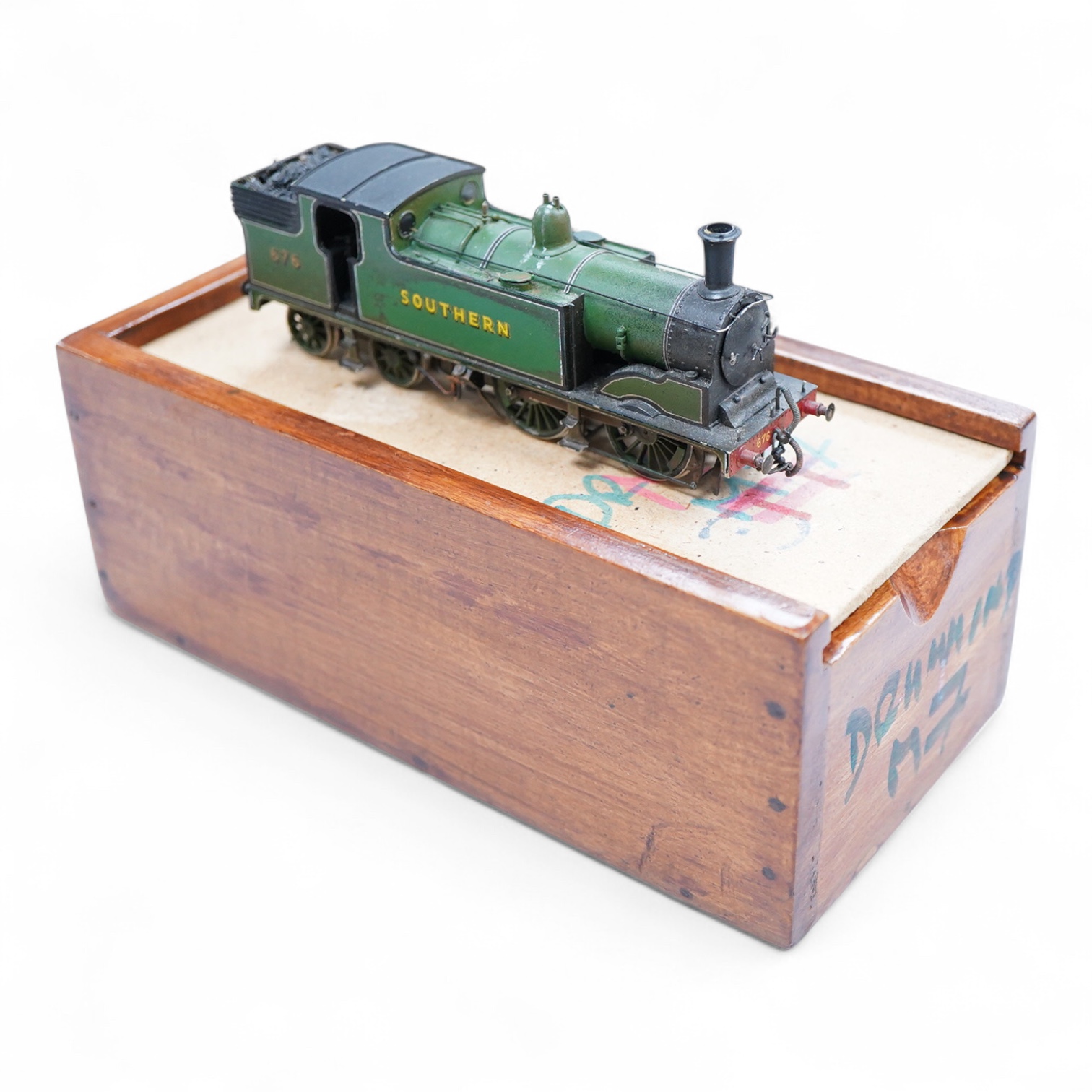 An EM gauge scratch built model railway locomotive by John Worsley, a Southern Railway Drummond M7 0-4-4T, 676, a detailed model with opening smoke box door showing the details of the blast pipe and boiler tube ends, spr